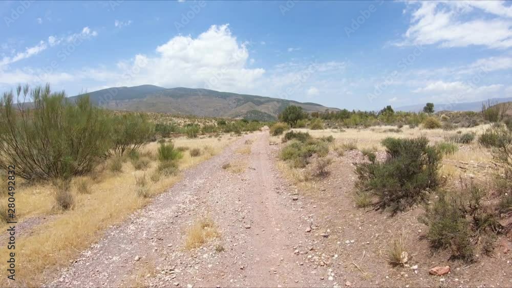 a mountain path on a summer day next to Alboloduy, province of Almeria, Andalusia, Spain a mountain path on a summer day next to Alboloduy, province of Almeria, Andalusia, Spain