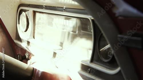 Old Car Interior with Retro Red Dashboard. Close-Up.