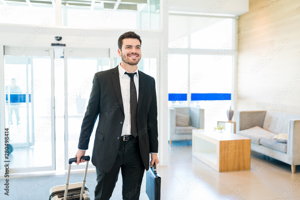Latin Businessman Wearing Suit Entering Hotel Latin Businessman Wearing Suit Entering Hotel