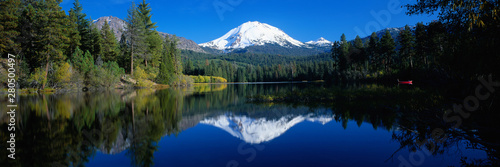 Amazing Nature Photography From Oregon with Mountains, Lake, Trees. Beautiful Reflection in Clear Water. Panoramic View of Landscape and Dramatic Blue Sky.