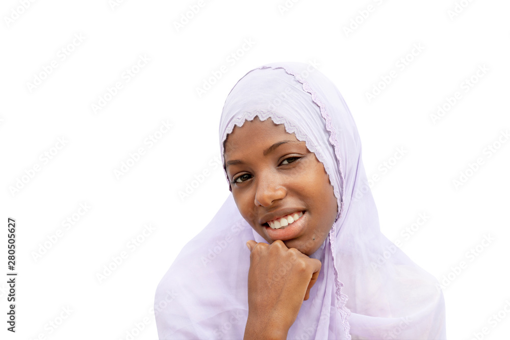 Beautiful Muslim girl wearing a headscarf and smiling, isolated, white background Beautiful Muslim girl wearing a headscarf and smiling, isolated, white background