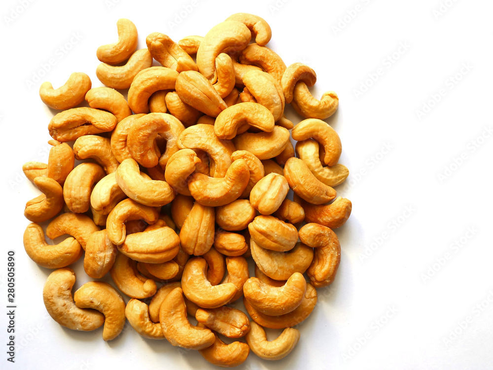 Cashew nuts placed on a white background