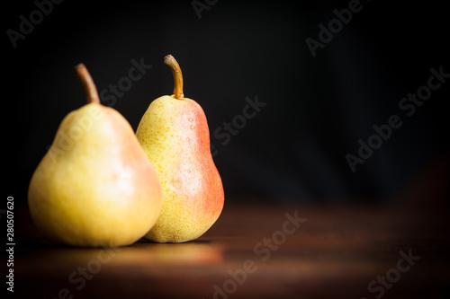 fresh pears on a wood table