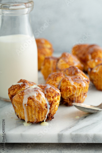 Canvas Print Cinnamon sugar monkey bread muffins with creamy glaze