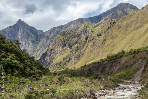 The Santa Teresa River in green lush valley. Hiking trail to Machu Picchu, Peru