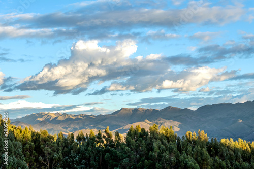 Wallpaper Mural Mountain landscape with fertile valley below steep forests and ancient agricultural terraces at sunset Torontodigital.ca