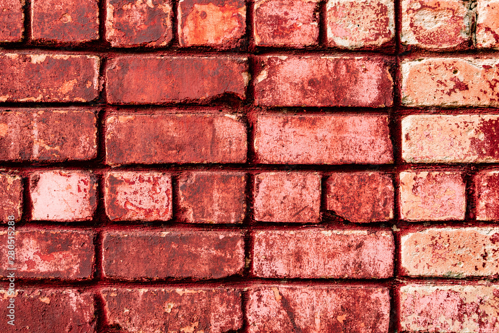 Obraz premium Texture of a brick wall with cracks and scratches which can be used as a background