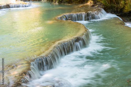 Beautiful landscape of Kuang Si falls an iconic popular waterfalls in the jungle park nearly Luang Prabang town  in north central Laos.