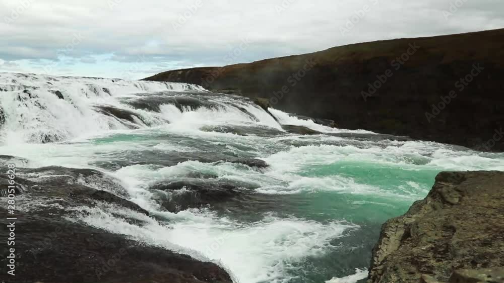 Massive waterfall located in the canyon of the Hvita River, Iceland. Wide angle shot of rapids at Gullfoss, Massive waterfall located in the canyon of the Hvita River, Iceland. Wide angle shot of rapids at Gullfoss,