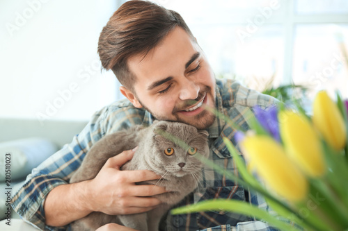 Young man with cute funny c...