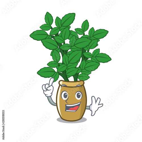 Finger lemon balm next the cartoon house