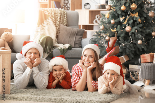 Happy family at home on Chr...