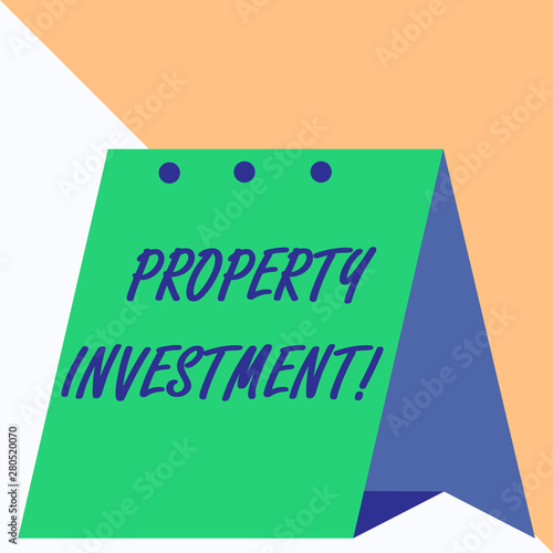 Writing note showing Property Investment. Business concept for Asset purchased and held primarily for its future income © Artur