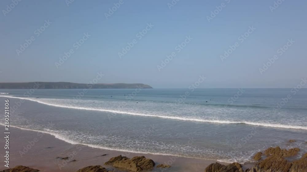 Right to Left Pan of Waves Crashing Against a Beautiful Sandy Beach Right to Left Pan of Waves Crashing Against a Beautiful Sandy Beach