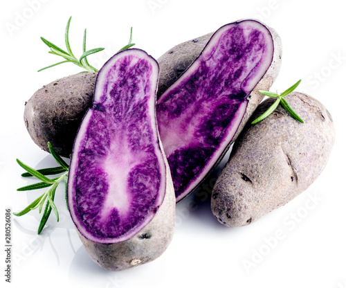 Vitolette noir or purple potato. On a white background. photo