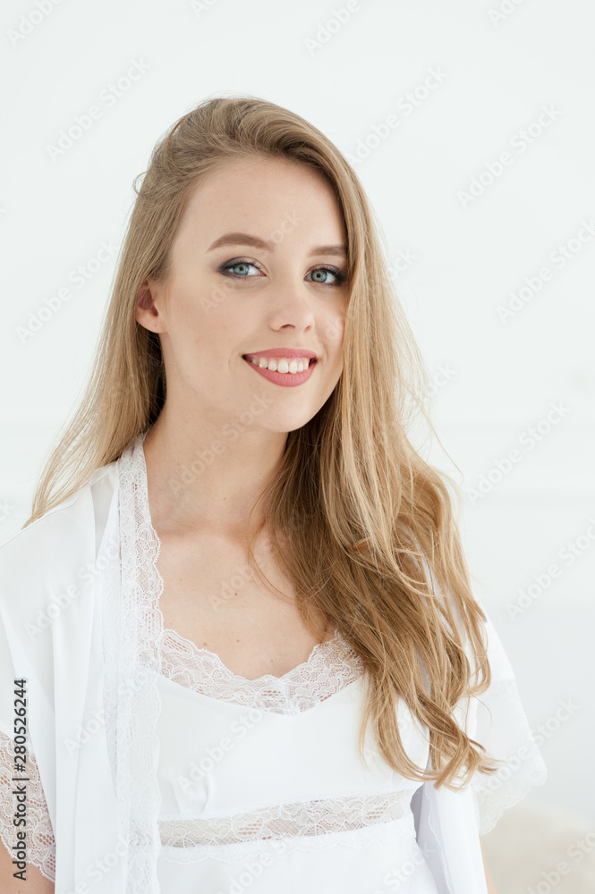 Beautiful happy young woman white underwear. Morning bride. Beautiful happy young woman white underwear. Morning bride.