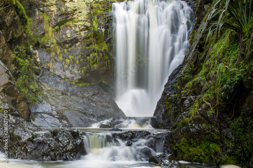 Fototapeta Naklejka Na Ścianę i Meble -  Stunning waterfall scenery in lush New Zealand native bush