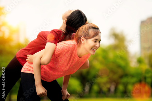 Photography Fitness Asian woman doing push ups during outdoor cross training workout