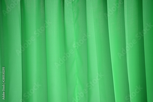green curtain or drapery background