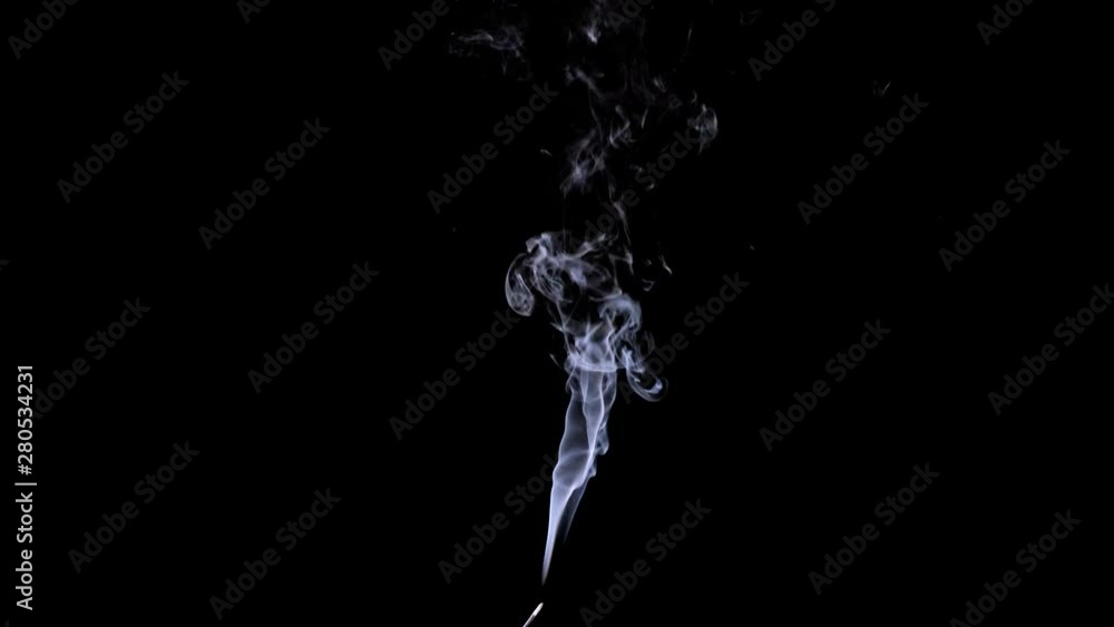 Thin Flexible Trickle of Smoke. Graceful Bends of the Blue Smoke. Natural Colorful smoke rises up and spins into graceful spirals. Footage is perfect for the layer with different blending modes. Thin Flexible Trickle of Smoke. Graceful Bends of the Blue Smoke. Natural Colorful smoke rises up and spins into graceful spirals. Footage is perfect for the layer with different blending modes.