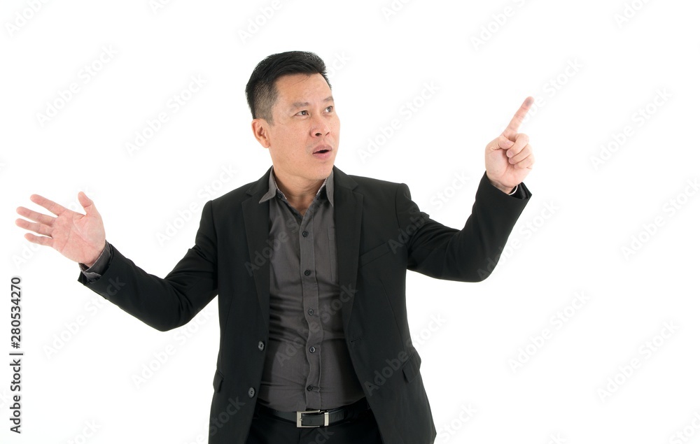 Smiling Businessman showing and pin pointing on something with excitement isolated on white background Smiling Businessman showing and pin pointing on something with excitement isolated on white background