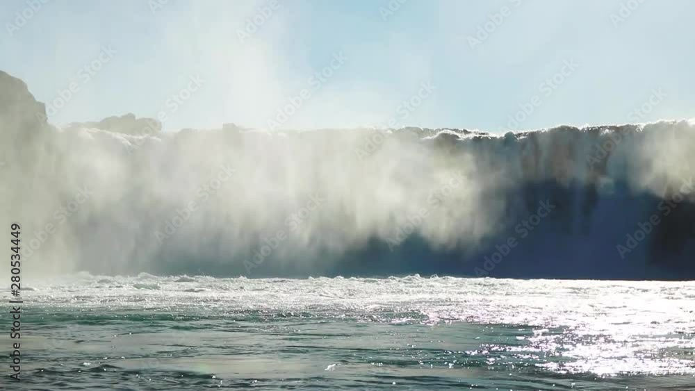 Godafoss in perfect daylight conditions during the summer. Shot of watefall with mist rising in the sunlight from below waterfall. Godafoss in perfect daylight conditions during the summer. Shot of watefall with mist rising in the sunlight from below waterfall.