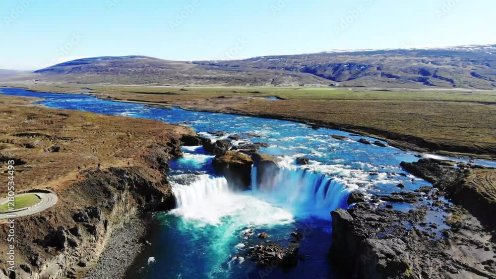 Godafoss in perfect daylight conditions during the summer. Backward aerial revealing the nature around Godafoss. Godafoss in perfect daylight conditions during the summer. Backward aerial revealing the nature around Godafoss.