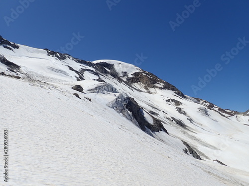 beautiful summer mountaineering to the top of weisseespitze from kaunertal in otztal alps in austria photo