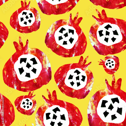 Seamless abstract pattern. Fruits are made in the technique of a collage of watercolor background. Drawn by hand. Decorative pomegranate on a yellow background.