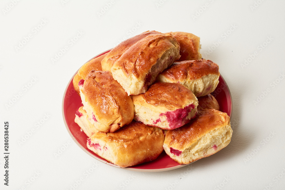 Buns with fruit. Homemade baking. Homemade Buns on plate Buns with fruit. Homemade baking. Homemade Buns on plate