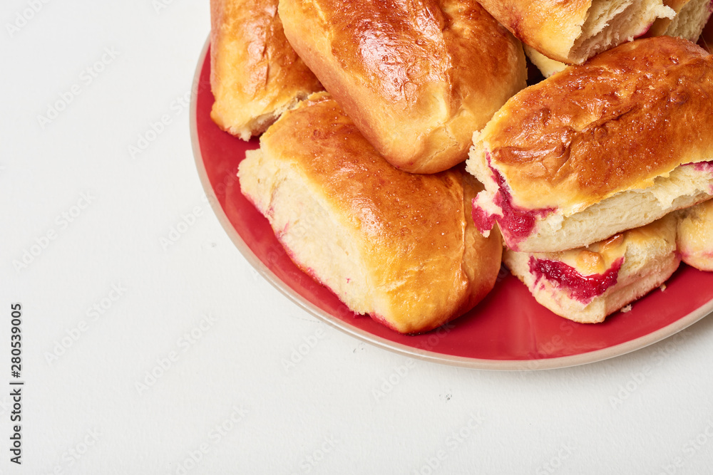 Buns with fruit. Homemade baking. Homemade Buns on plate Buns with fruit. Homemade baking. Homemade Buns on plate