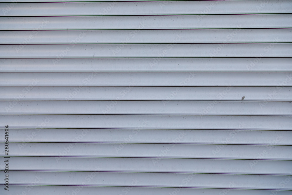 Aluminum texture in stripes as background surface with natural pattern for design and decoration Aluminum texture in stripes as background surface with natural pattern for design and decoration
