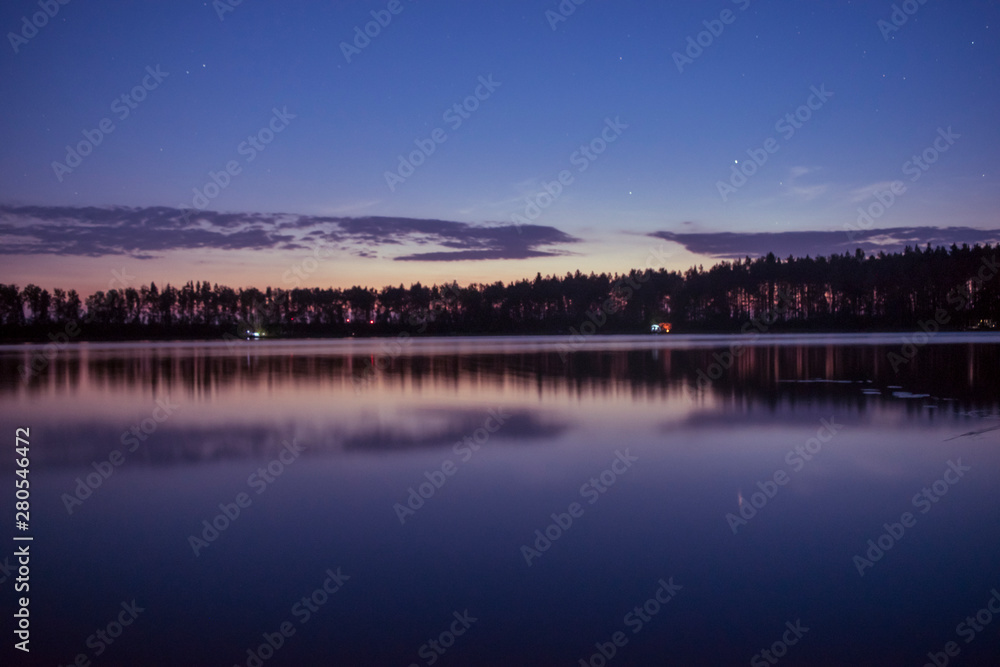 Dawn over the forest lake Dawn over the forest lake