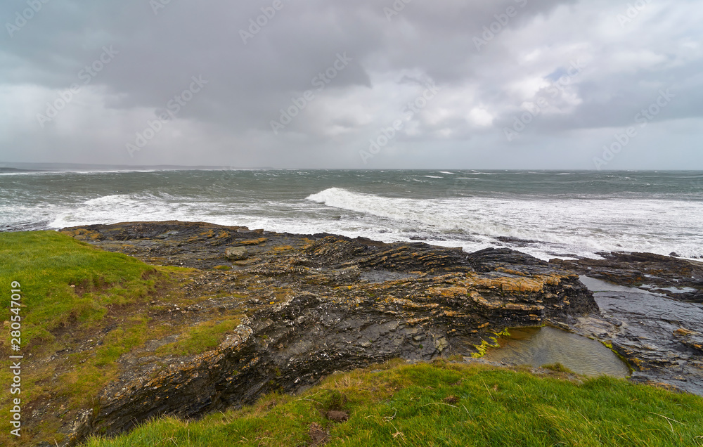 A large Atlantic Storm moves over Slade and County Wexford, with High Winds and a large Running Swell coming in from the West.