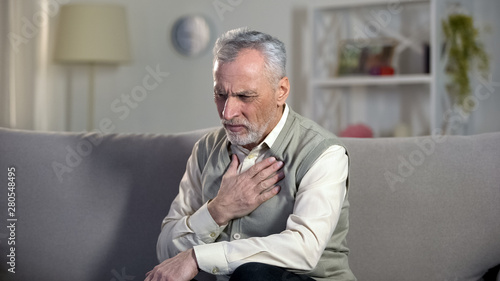 Pensioner suffering chest pain, heart attack, problems with breathing, asthma