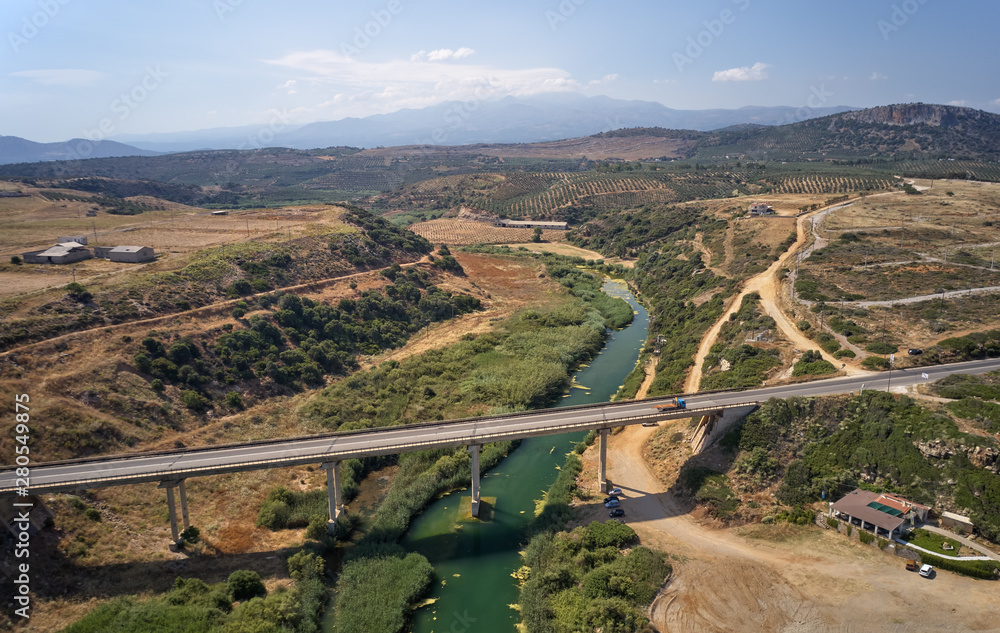 Aerial view on road bridge over river near Geropotamos beach on Crete, Greece.