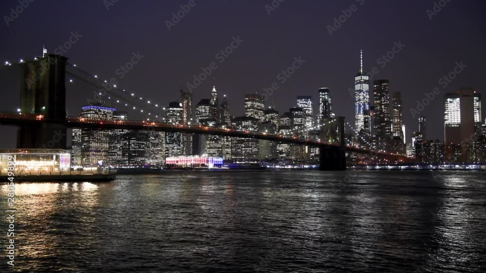 NEW YORK CITY - DECEMBER 2018: Brooklyn Bridge traffic at night, New York City NEW YORK CITY - DECEMBER 2018: Brooklyn Bridge traffic at night, New York City