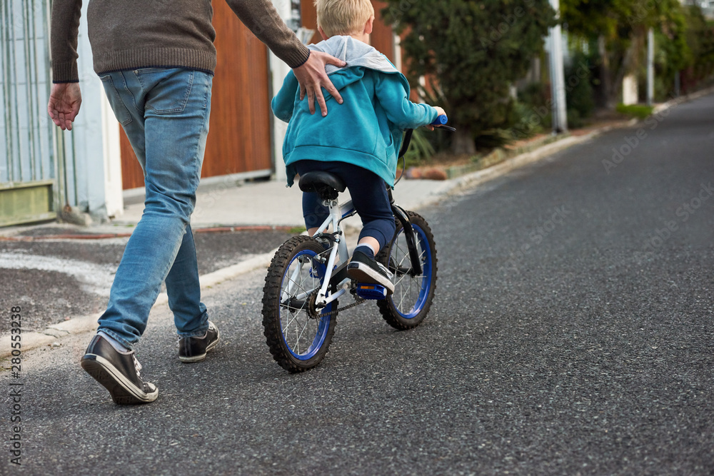 Obraz premium Father son riding bikes