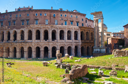 View of many stones and ruins before Temple of Apollo Medicus Sosianus and Teatro Marcello photo