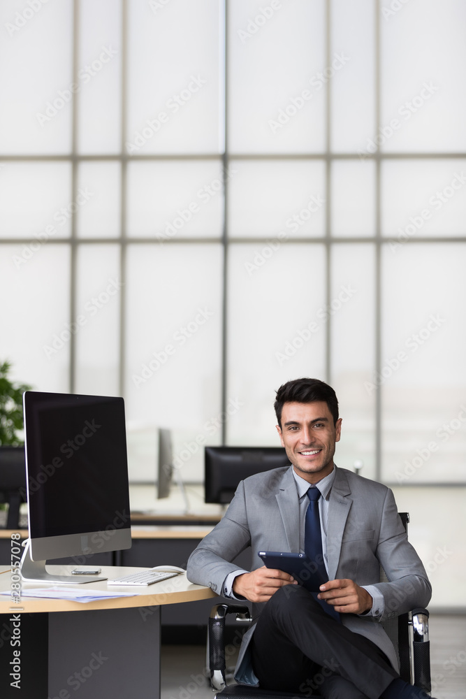 Caucasian businessman has tablet computer in hand.. Caucasian businessman has tablet computer in hand..