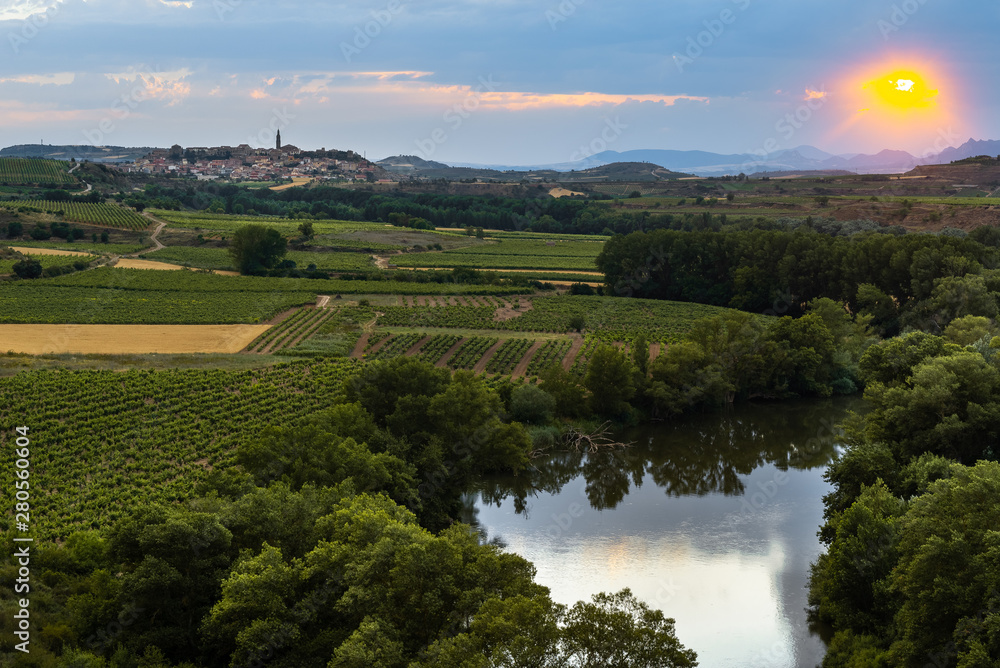 Ebro river at sunset with Briones village as background, La Rioja, Spain