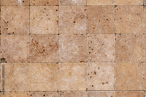 Wallpaper Mural Background texture of old beige marble wall from a variety of large tiles square shaped Torontodigital.ca