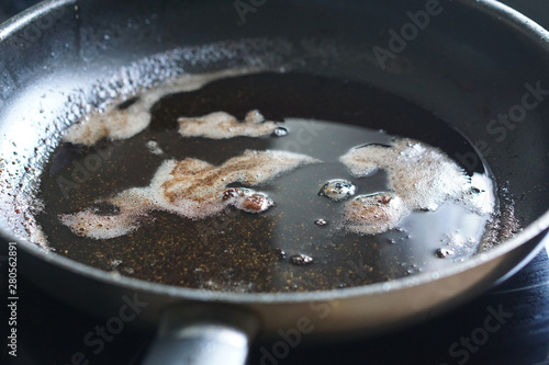 oil and fat in pan after cooking