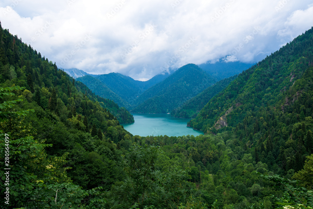 blue lake among mountains in Abkhazia