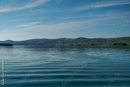 Wonderful calm blue adriatic sea shot from moving sailing boat. © 2STOCKista
