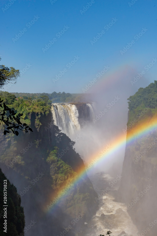 picture of the Victoria Falls and a rainbow while beautiful sunlight picture of the Victoria Falls and a rainbow while beautiful sunlight