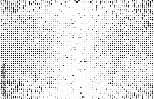 Halftone texture is black and white. Abstract monochrome background of dots.