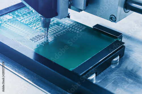 Obraz na płótnie Automated manufacturing process for boards or microchips for electronics or computers.