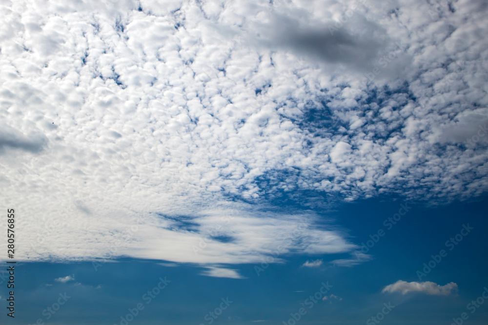 Soft white clouds against blue sky background Soft white clouds against blue sky background