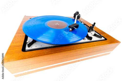 Vintage turntable with a blue vinyl isolated on white